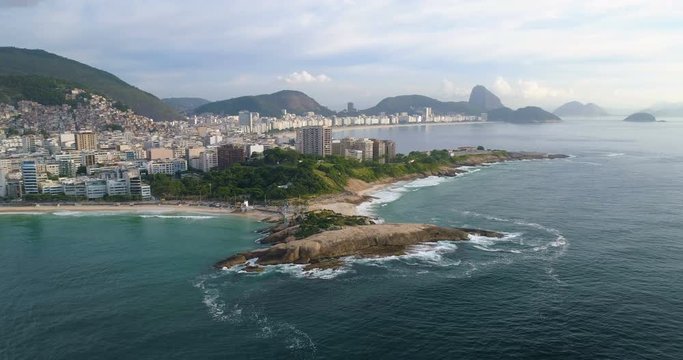 Aerial view of Rio de Janeiro skyline with Copacabana Beach and Sugarloaf mountain, Brazil. Morning light
