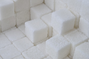  big amount of square cubes of sugar background