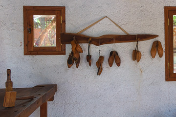 Vintage wooden Shoe lasts. Hanging on the wall.