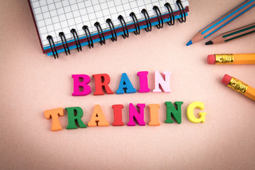 Brain Training. Wooden letters on the office desk, informative and communication background