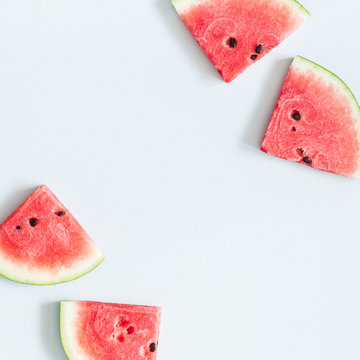 Watermelon pattern. Red watermelon on blue background. Summer concept. Flat lay, top view, copy space, square