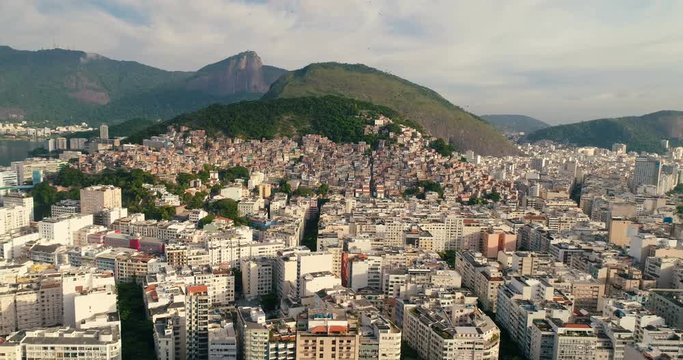 Aerial view above city buildings with Corcovado hill in the distance. Rio de Janeiro, Brazil