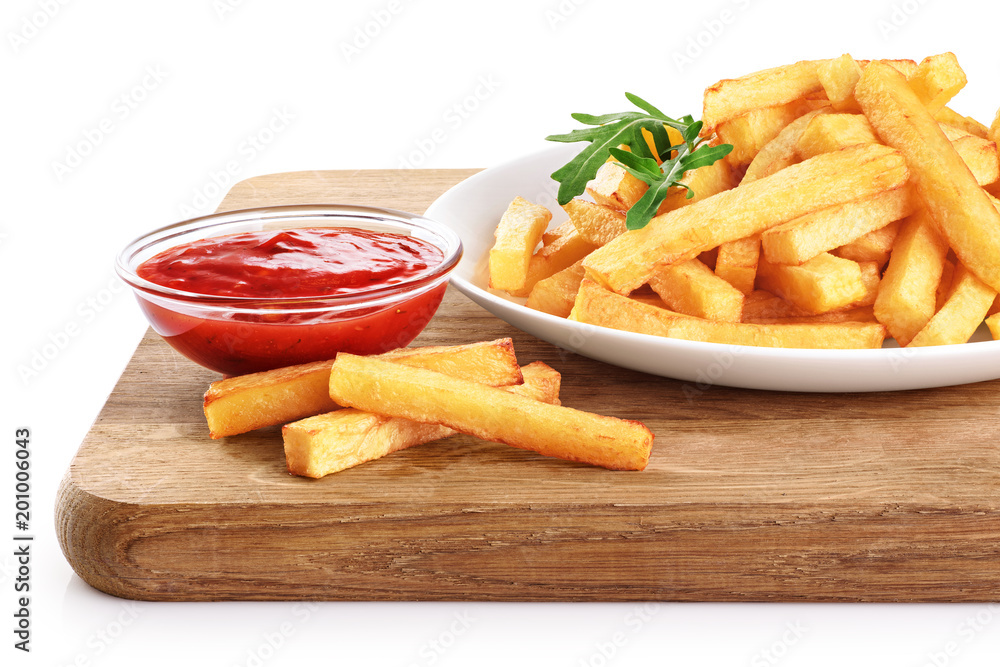 Wall mural Plate with french fries, ketchup and rucola on a wooden board.