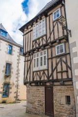 Quimper, old half-timbered houses in a small street, beautiful touristic town in Brittany 
