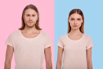 Confident looks. The portraits of a handsome young man posing on a pink background and a pretty...