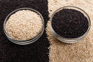 fresh sesame seeds on a rustic background