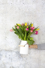 white Flower vase with colorful tulips