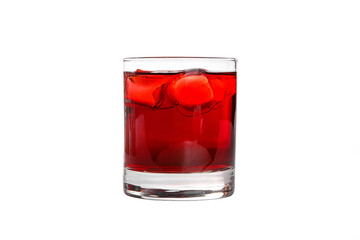 Single-color transparent cocktail, refreshing in a low glass with ice cubes with taste of berries, cherries, strawberries, grapefruit. Side view Isolated white background. Drink for the menu