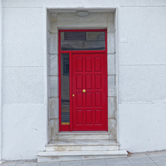 red door on white wall, elegant house entrance