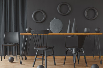 Black dining room with decoration