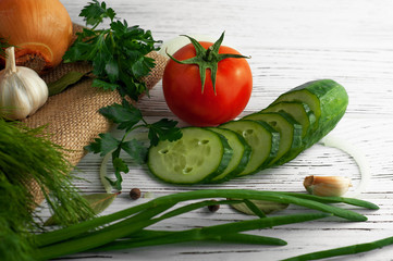 Onions, garlic, greenery and tomatoes.
