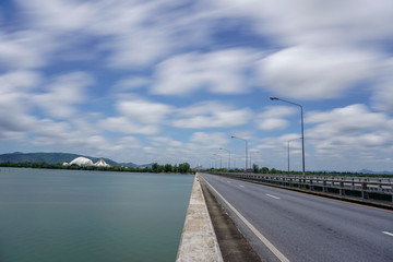 Empty Tinsulanonda bridge with smooth cloud and Sea in broad daylight