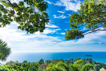 Scenic forest wilderness landscape with blue sky of Phuket National Park with blue surface of west sea district of Thailand.