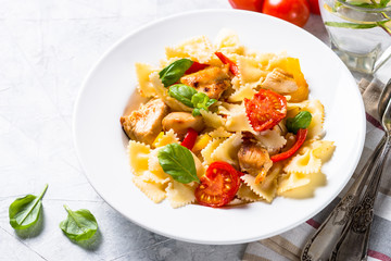 Pasta with chicken and vegetables. Close up.