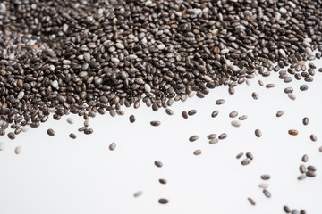 Chia seeds isolated with white background. Healthy superfood.