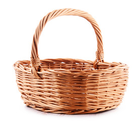 Empty wicker basket isolated on white