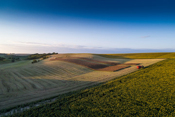 Fototapeta na wymiar aerial photo of working combine