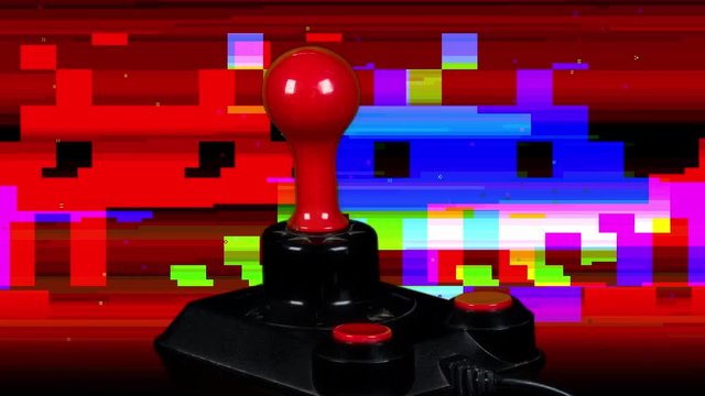 a retro computer arcade game joystick spinning around 360 degrees with distorted alien motif in the background