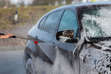 Car without touch washing self-service. Wash with water and foam.