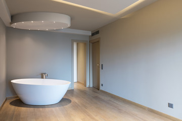 Naklejka na ściany i meble Modern bedroom with bathtub, luxury apartment