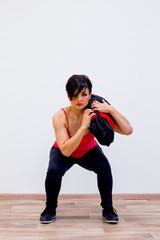 Naklejka premium Women exercising in a gym