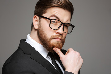 Close up portrait of a pensive young businessman