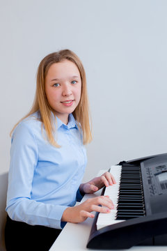 Girl playing synthesizer
