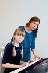 Girl playing synthesizer