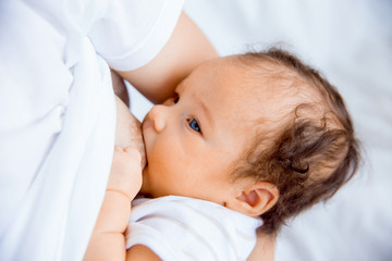 Mother breastfeeding her baby