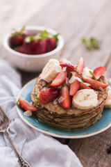 Banana and strawberries pancakes
