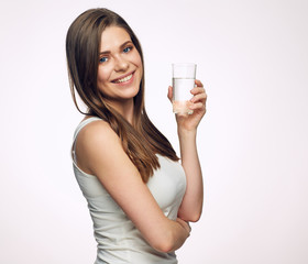 Smiling woman holding water glass. Isolated portrait on white.