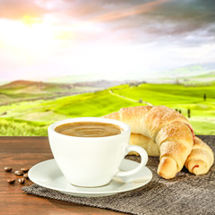 Coffee and tuscany landscape 