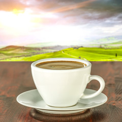 Coffee and tuscany landscape 