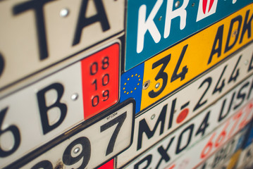 Collection of European license plates from different countries.