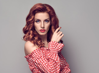 PinUp Portrait Beauty Redhead Girl.Curly hairstyle