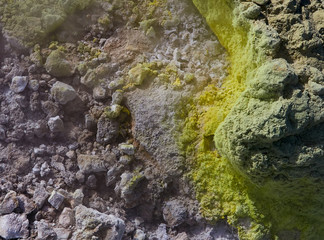 Sulphur gas coming out of the edge of the volcanic crater on the Vulcano island in the Aeolian islands, Sicily, Italy
