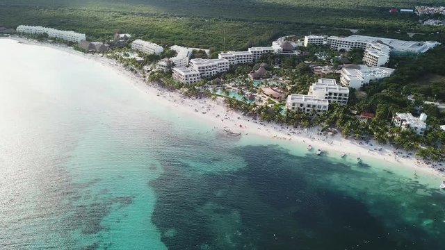 Akumal bay Caribbean beach in Riviera Maya. Aerial view of Sea side beach. Top view aerial video of beauty nature landscape with tropical beach in Akumal, Mexico. Caribbean Sea, coral reef, top view