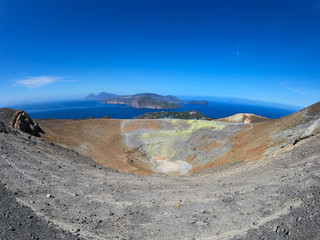 View of the volcanic crater and Lipari and Salina islands from the top of the volcano of the...
