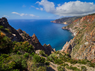 Fototapeta na wymiar Beautiful mountain and coast scenery on Lipari hiking trails, Aeolian islands, Sicily, Italy 