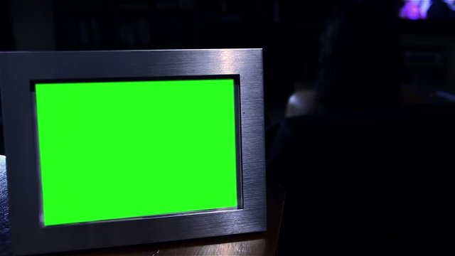 Photo Frame Green Screen. You can replace green screen with the footage or picture you want. You can do it with “Keying” effect in After Effects  (check out tutorials on YouTube). 
