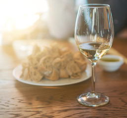 Glass of white wine is on the table. Wine degustation.