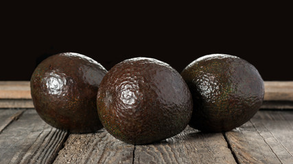 Avocado on a wooden background