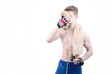 Fitness and healthy lifestyle. The guy with the dumbbell. White background. 