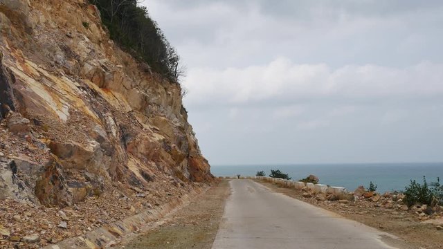 The coastal road on an island. Royalty high-quality free stock footage of the coastal road on Nam Du island. Kien Giang, Vietnam