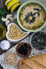 Conventional hummus with main ingredients.Homemade recipe