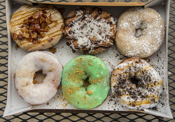 Colored donuts in the box