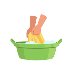 Washing clothes in green basin by hands, cleaning and housework concept vector Illustration on a white background - obrazy, fototapety, plakaty