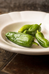 Green Padron Peppers in the Frying Pan. Pimientos de Padron.
