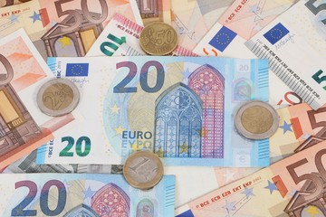 a heap of different euros are lying in the studio