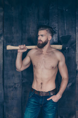Fototapeta na wymiar Vertical portrait of confident strong manful fearless severe powerful erotic muscles muscular ideal handsome attractive focused woodsman carrying steel arms on shoulder isolated on wooden background